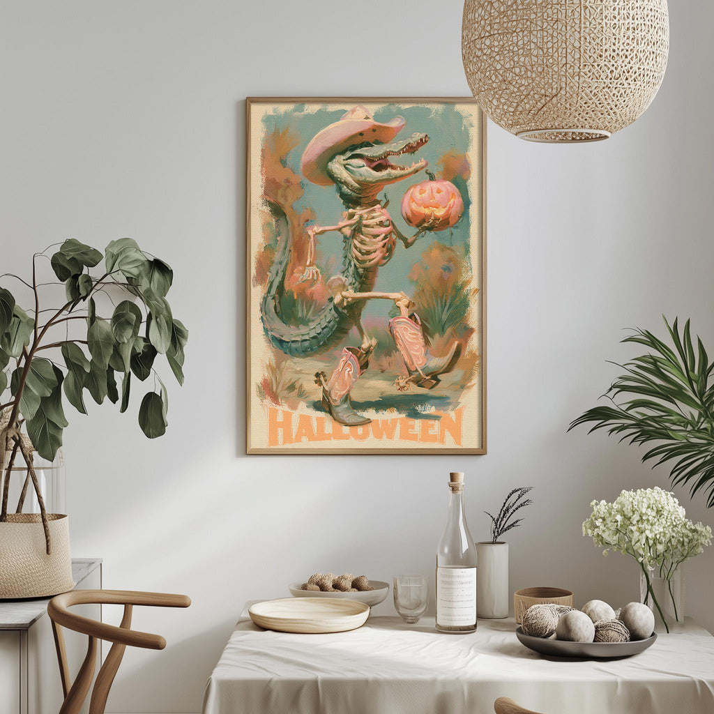 a Halloween-themed poster hanging on a wall, with a table set up below it. The table has various items on it, including a bottle, a bowl, and a vase. There are also some plants and decorative elements in the room.