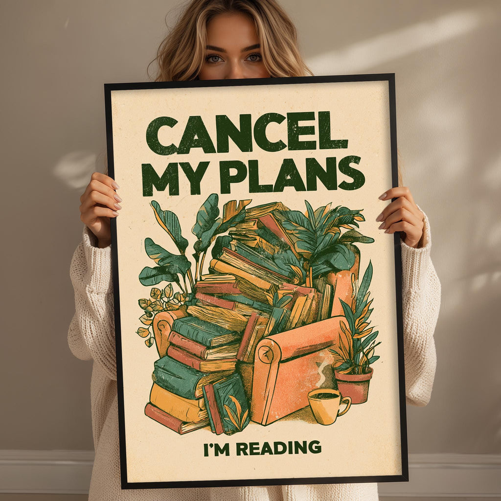 A woman holding a framed poster with the text "CANCEL MY PLANES I'M READING" and an illustration of a stack of books surrounded by plants.
