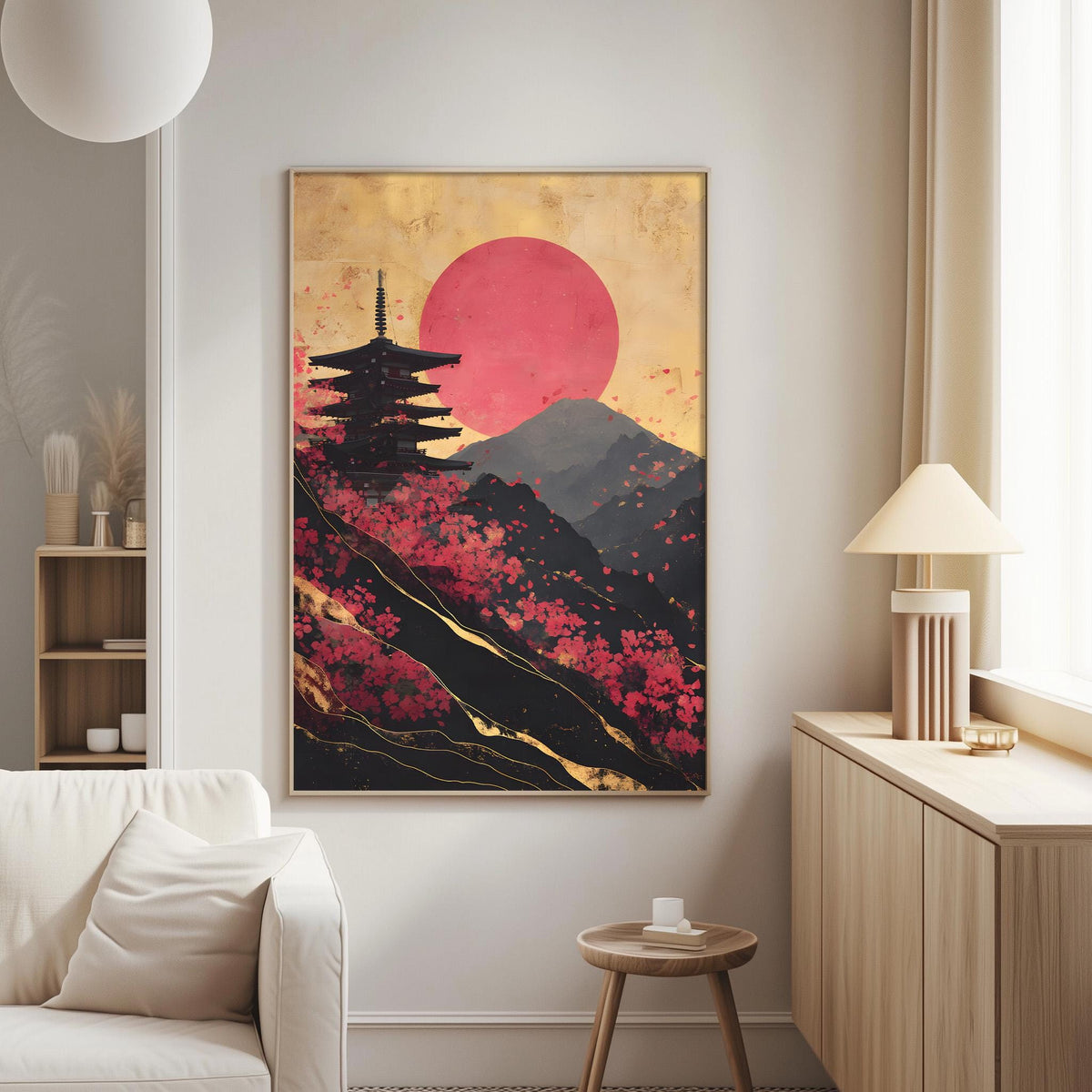 a large framed artwork depicting a pagoda on a mountain with a red sun in the background.