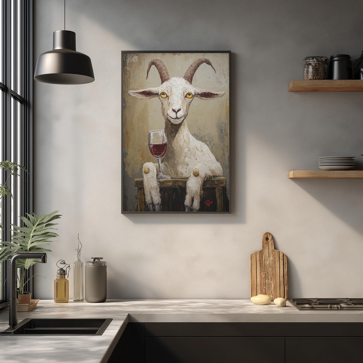 a kitchen counter with various items, including a framed painting of a goat holding a glass of wine, a wooden cutting board, and a potted plant.