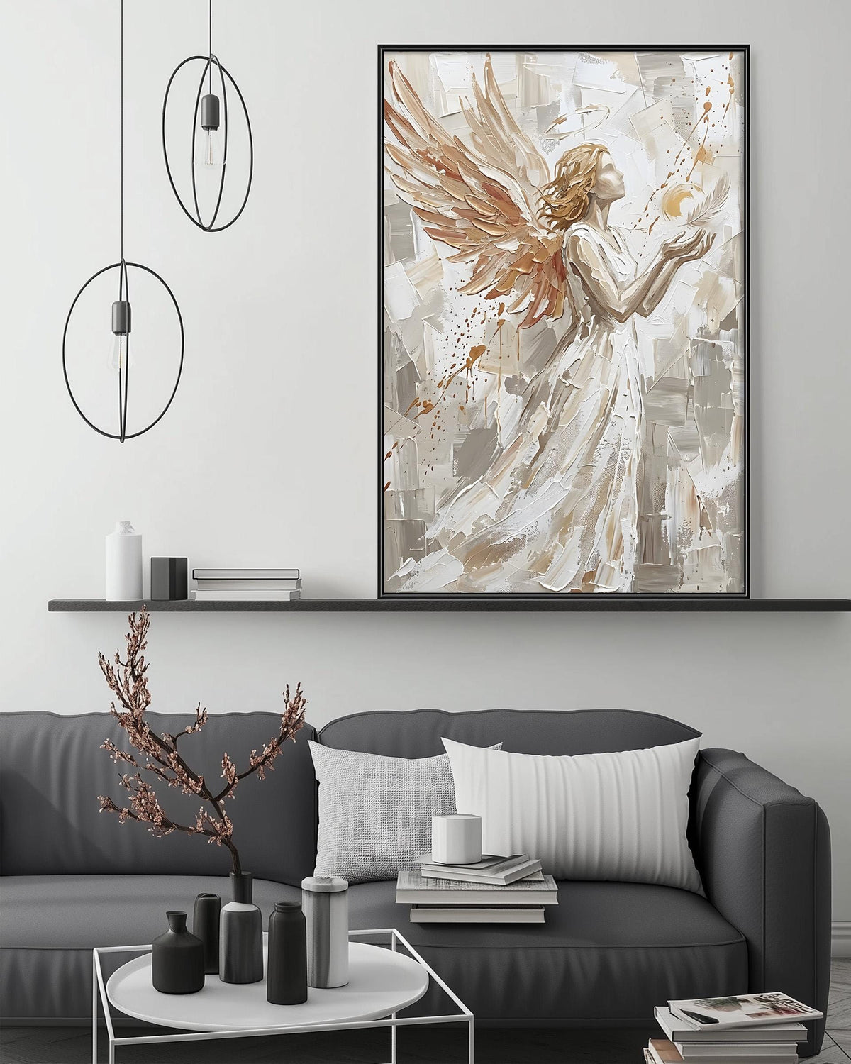 a modern living room with a gray sofa, a coffee table, and a large abstract painting of an angel with outstretched wings hanging above the sofa.
