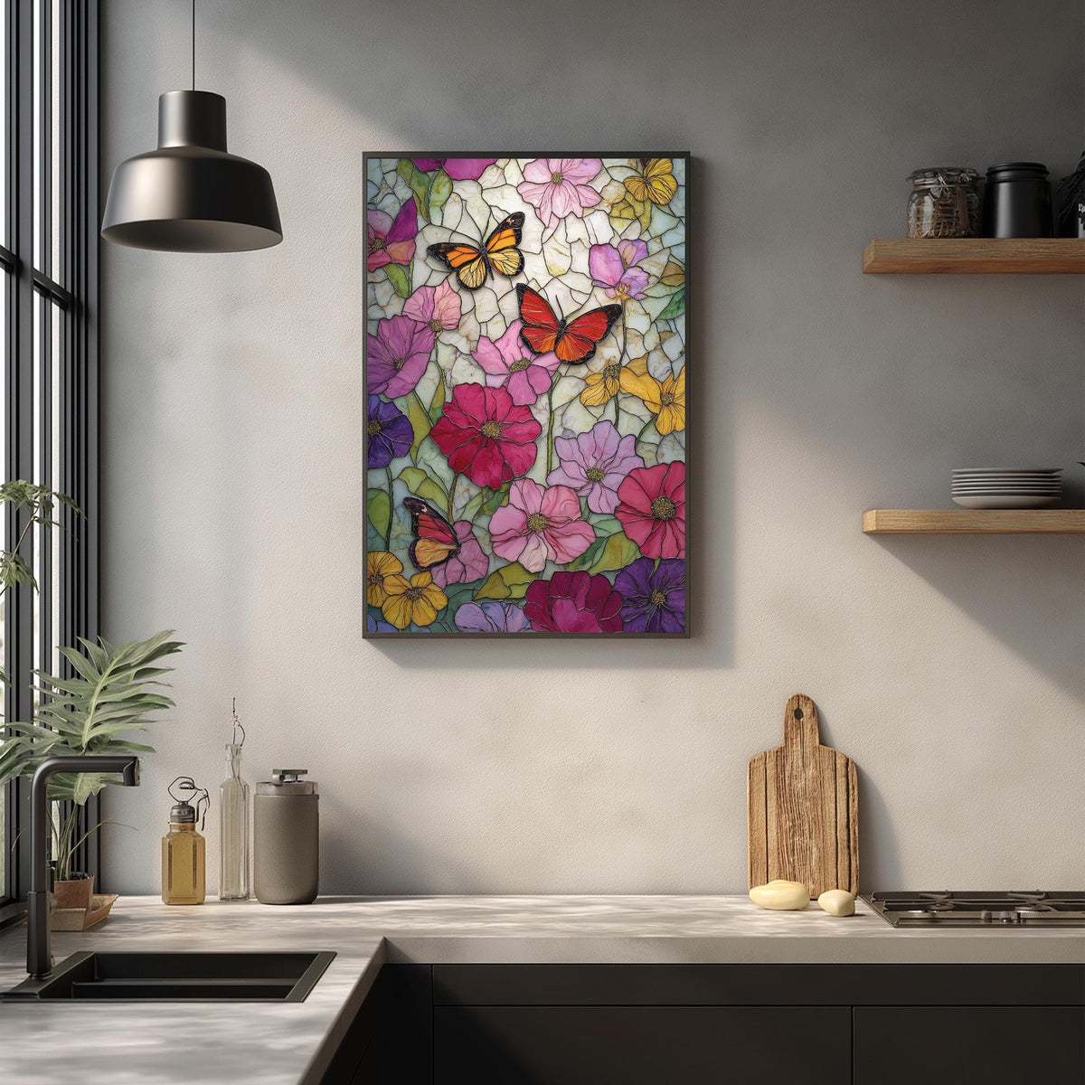 a kitchen counter with a framed stained glass artwork depicting colorful butterflies and flowers hanging on the wall above it.