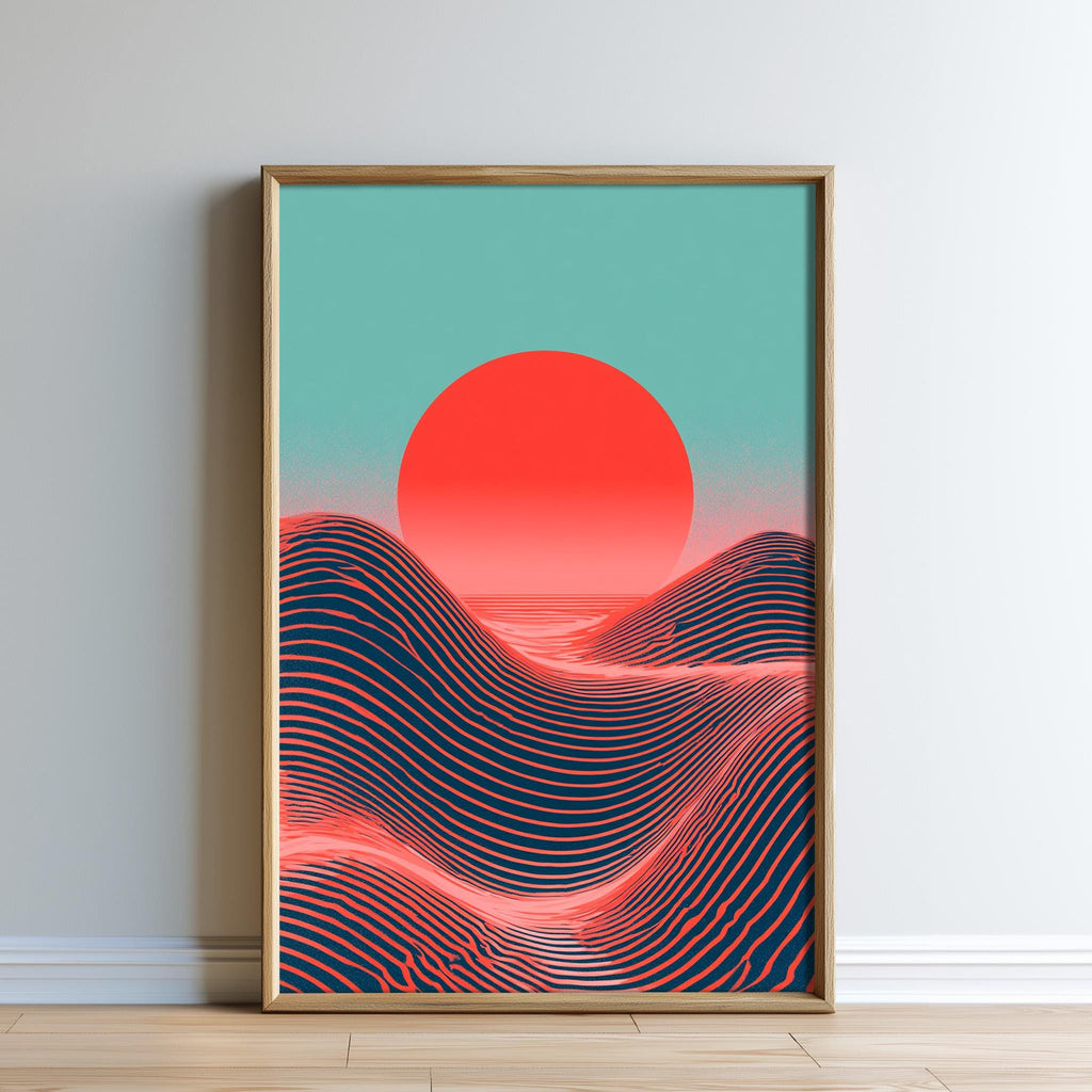The image is a framed poster depicting a sunset over a mountainous landscape with a large, red sun in the sky.