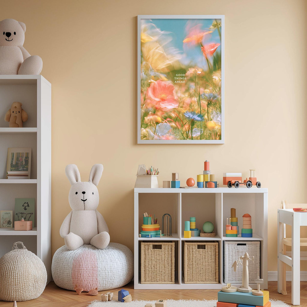 A cozy and colorful children's bedroom with a large stuffed bunny, a bookshelf, and a toy chest filled with toys. The walls are painted a light peach color, and a framed picture of flowers hangs above the bookshelf.