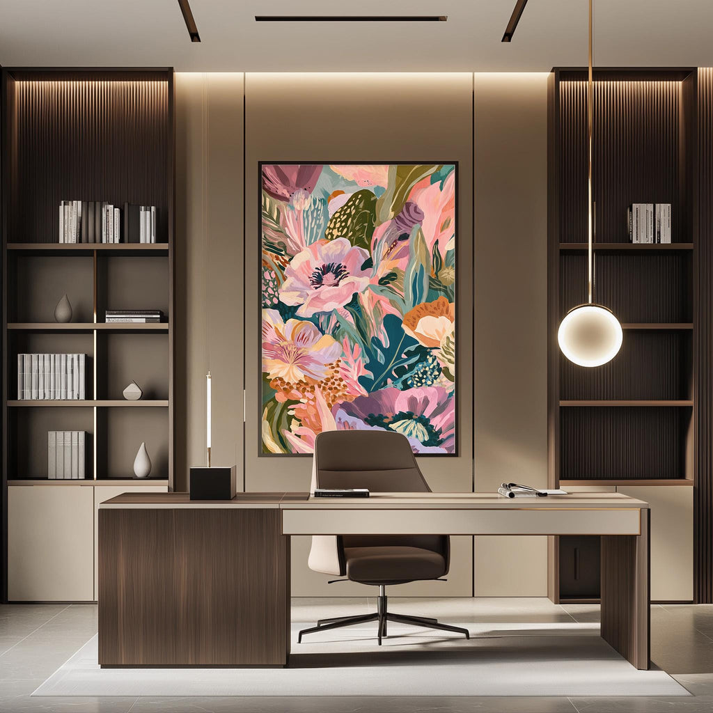 a modern and stylish home office with a large, colorful floral painting on the wall above a wooden desk. The desk is positioned in front of the painting, creating a focal point in the room. The office also features built-in bookshelves and a hanging light fixture, contributing to the overall contemporary design.