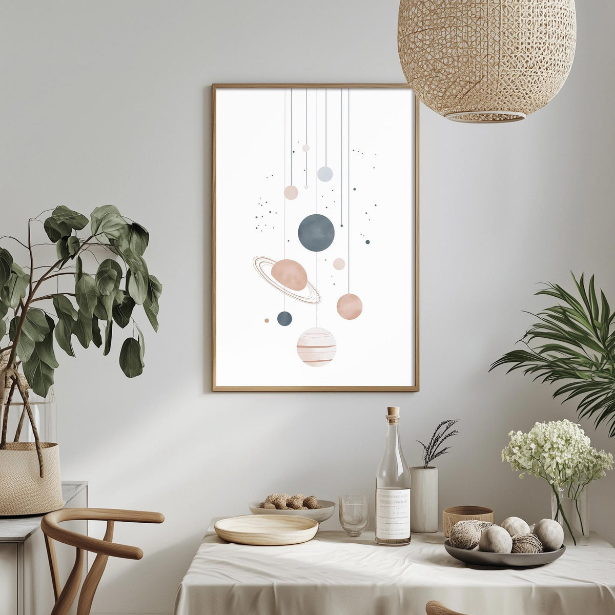 a modern and minimalist dining room with a white tablecloth, a potted plant, a hanging light fixture, and a framed artwork depicting planets hanging from the ceiling.
