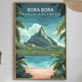 a framed poster of a tropical island landscape with palm trees, a beach, and a mountain in the background, hanging on a wall above a dining table with various items on it.