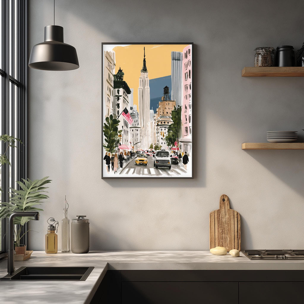 a framed painting of a city street with tall buildings, cars, and people, hanging on a wall above a kitchen counter.