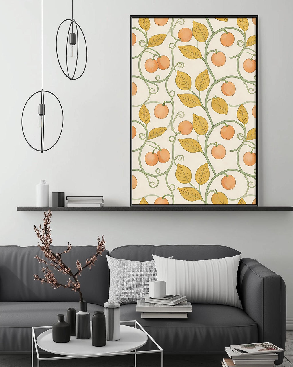 a modern living room with a gray sofa, a coffee table, and a large framed print of a repeating pattern of orange leaves and branches on the wall above the sofa.