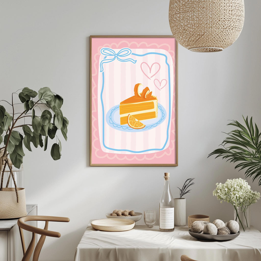 a dining table with a white tablecloth, a vase of flowers, a bottle of wine, and a framed illustration of a slice of cake with orange slices and hearts.
