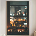 a cozy living room with a large window that offers a view of a city at night, creating a warm and inviting atmosphere. The window is adorned with candles, adding a touch of romance and intimacy to the scene. The room is furnished with a white sofa, a wooden side table, and a lamp, creating a harmonious and comfortable living space.
