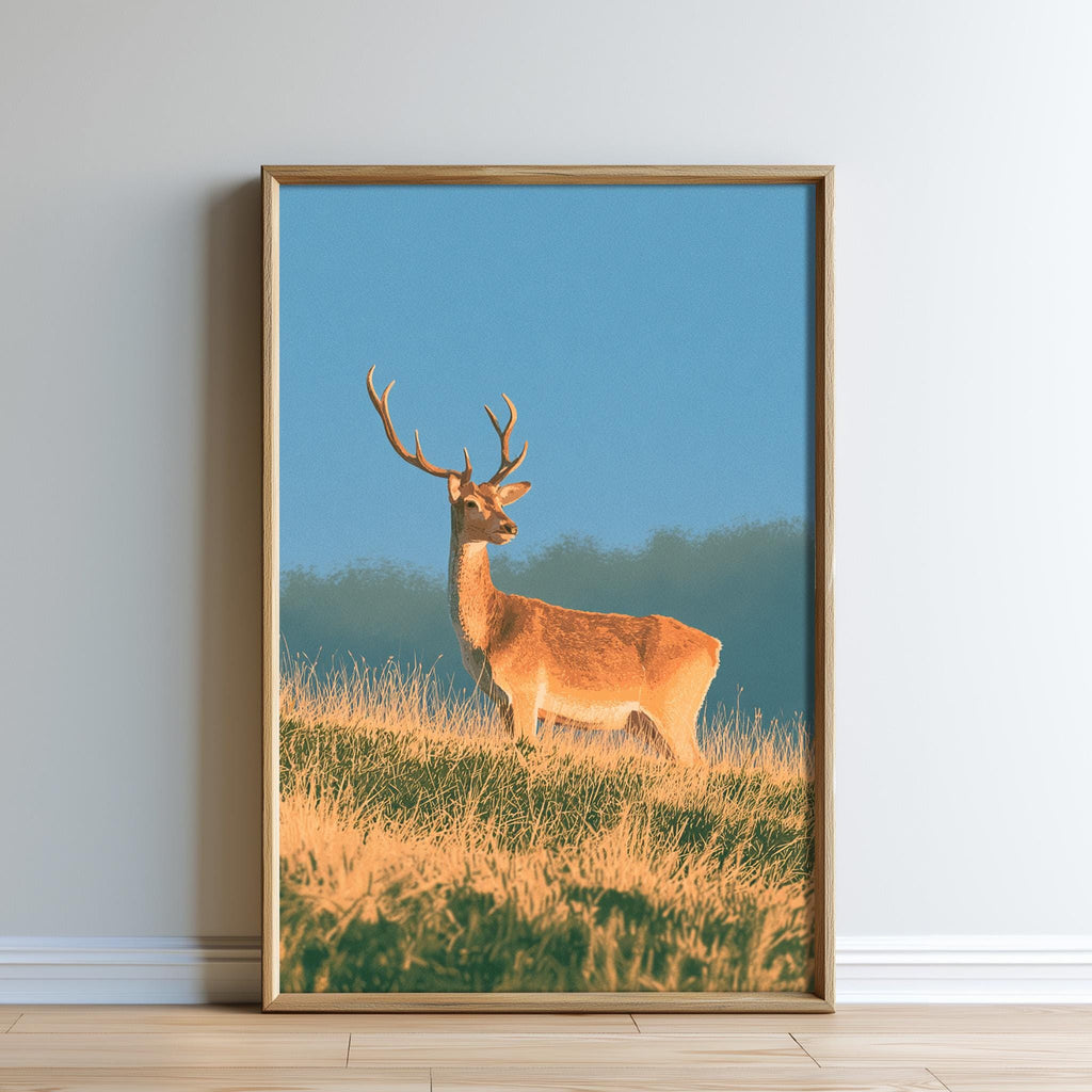 A deer standing in a grassy field with a blue sky in the background.