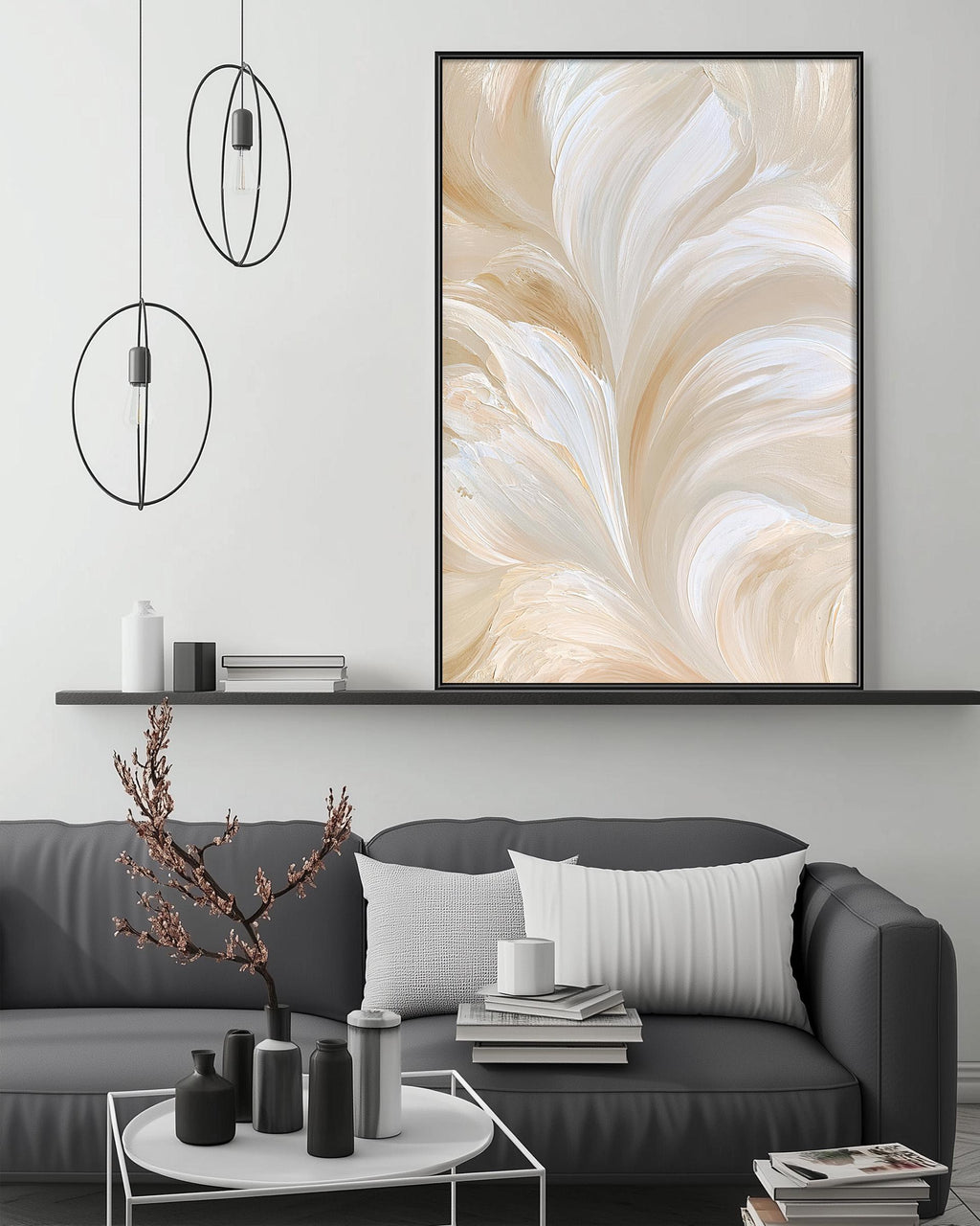 a modern living room with a gray sofa, a coffee table, and a large abstract painting on the wall above the sofa.
