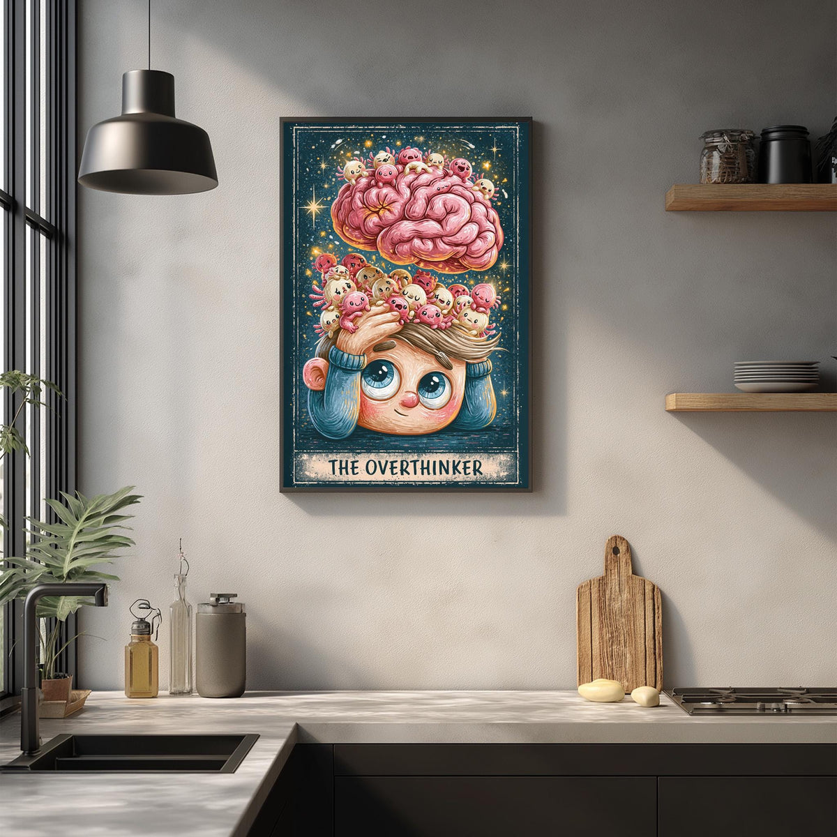 a framed illustration of a cartoon character with a pink brain and a flower crown, hanging on a wall above a kitchen counter.