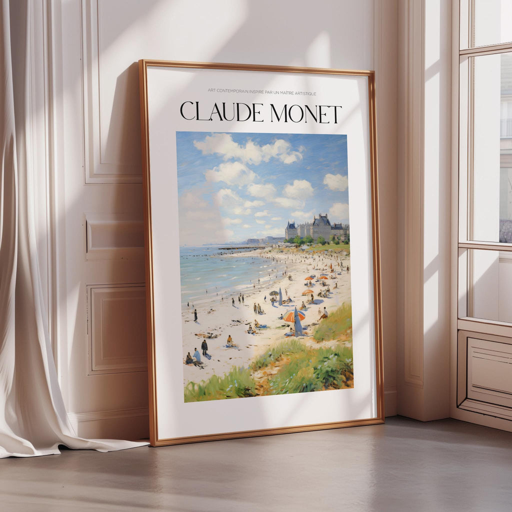 A framed painting of a beach scene with people enjoying the sun and sand, with buildings and a cloudy sky in the background.