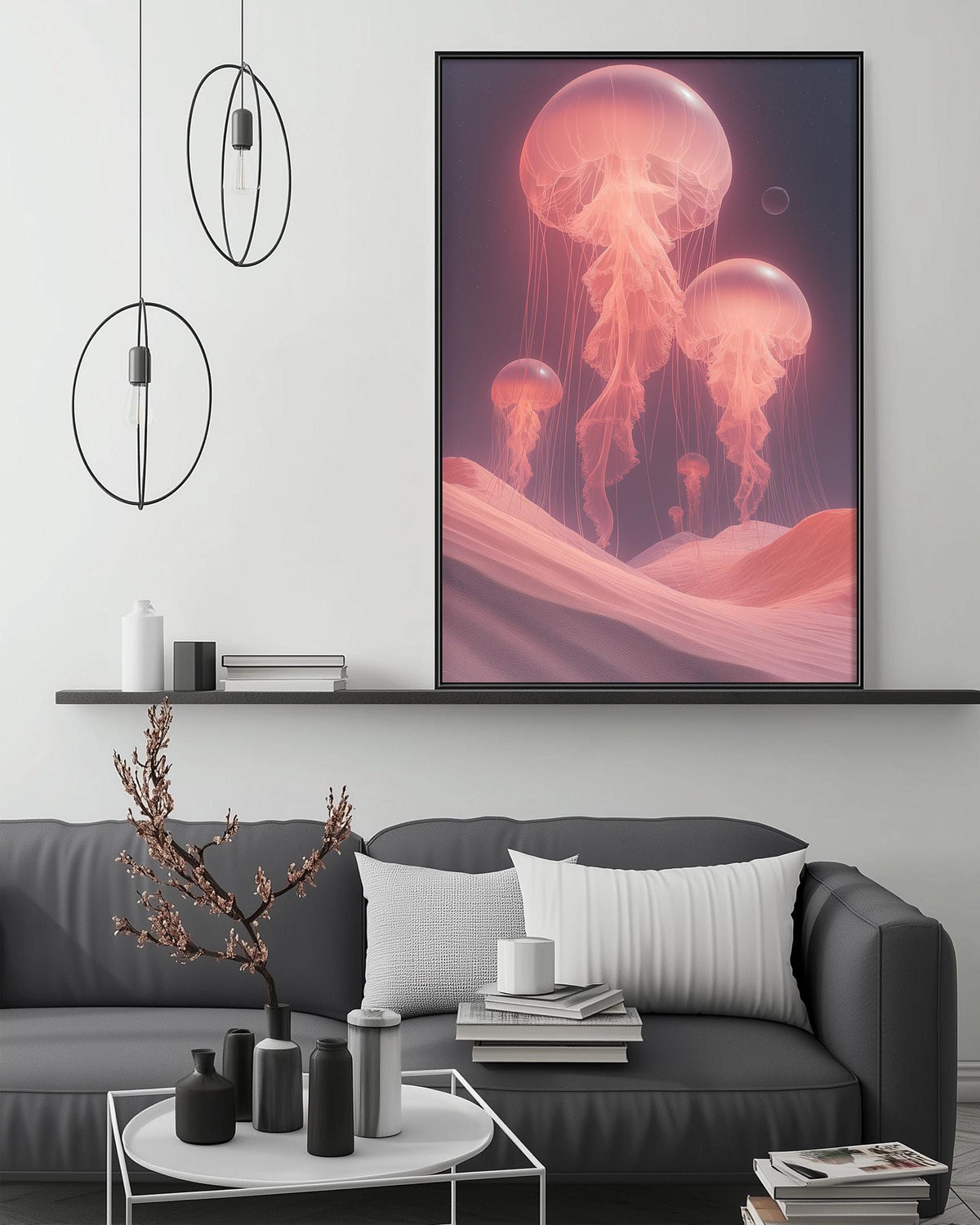a large, vibrant painting of jellyfish floating in a pinkish-orange ocean scene, hanging on a wall above a gray couch with a coffee table in front of it.