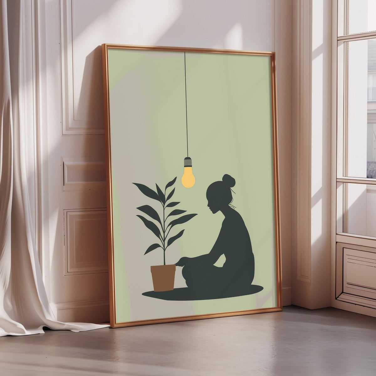 A framed poster depicting a silhouette of a person sitting on the floor next to a potted plant, with a light bulb hanging above the plant.