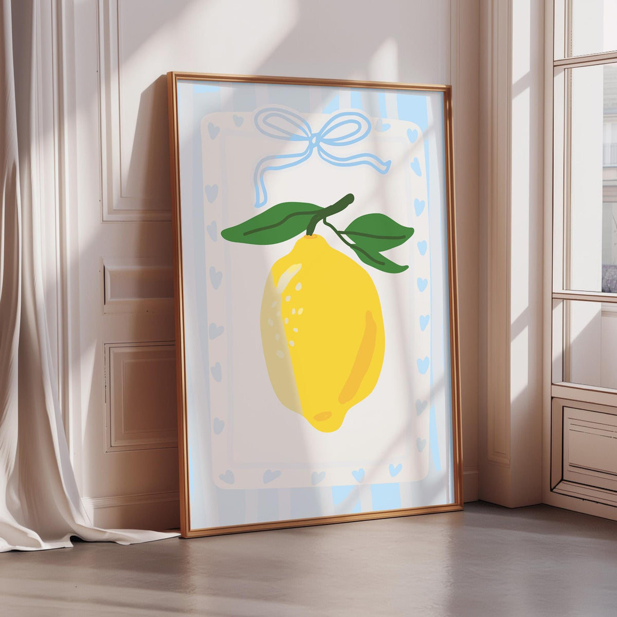 A framed illustration of a lemon is displayed on a wall, with a blue ribbon and hearts around it.