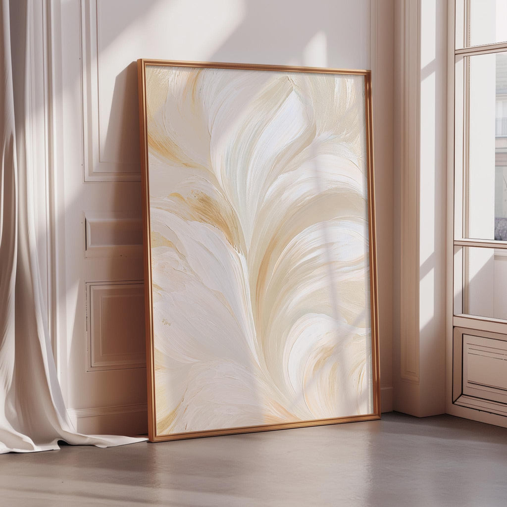 a large, abstract painting with a floral design in shades of white and beige, displayed in a gold frame on a wooden floor.