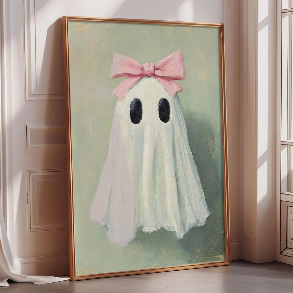 a painting of a ghost with a pink bow on its head, displayed on a wall in a room with a window.