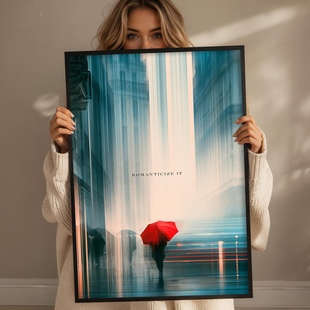 A woman holding a framed print of a painting depicting a person with a red umbrella walking down a city street.