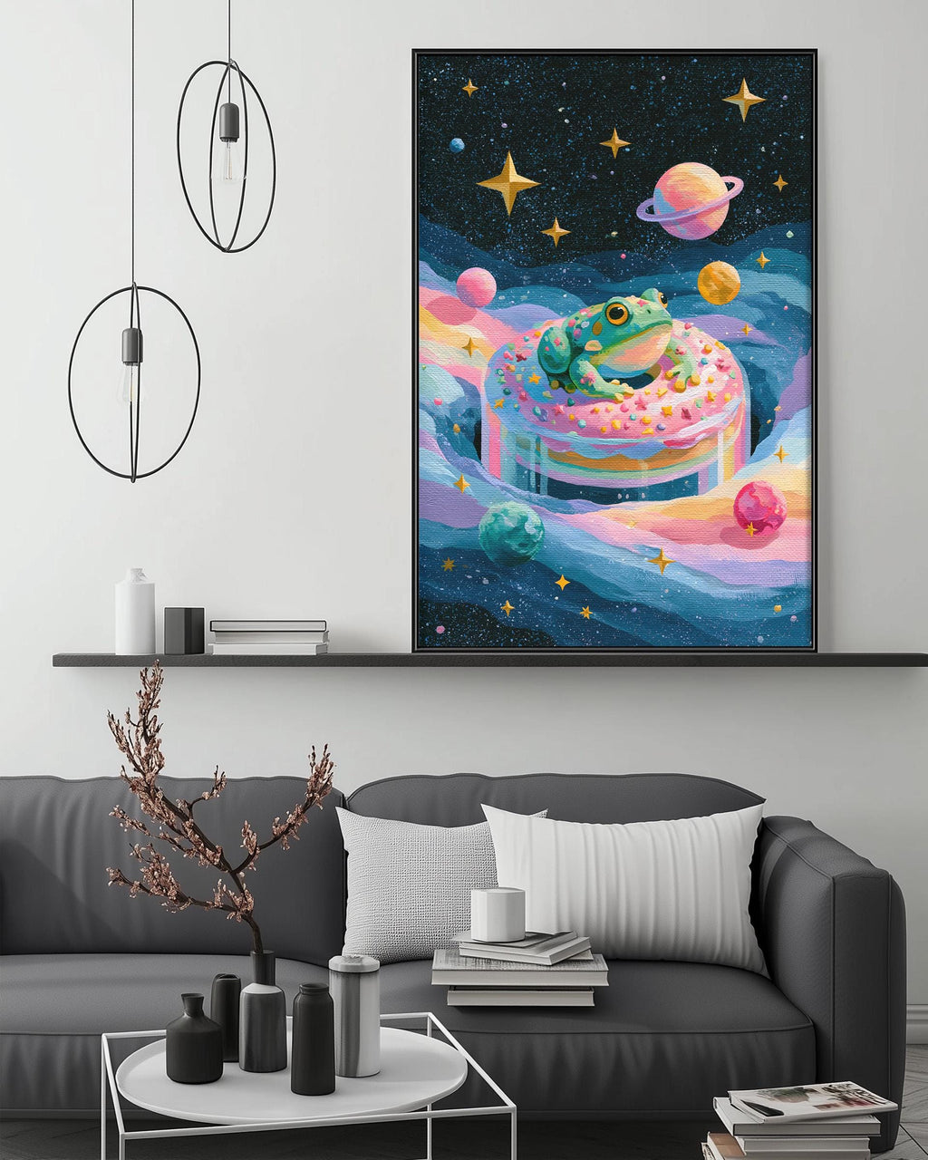 a vibrant and whimsical painting of a frog sitting on a cake floating in a starry space, surrounded by planets and stars. The painting is displayed on a wall above a gray couch, which is adorned with various decorative items such as a potted plant, vases, and books. The overall scene creates a playful and imaginative atmosphere in the living room.