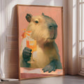 A painting of a capybara holding a glass of orange juice, with a pink background and a wooden frame.