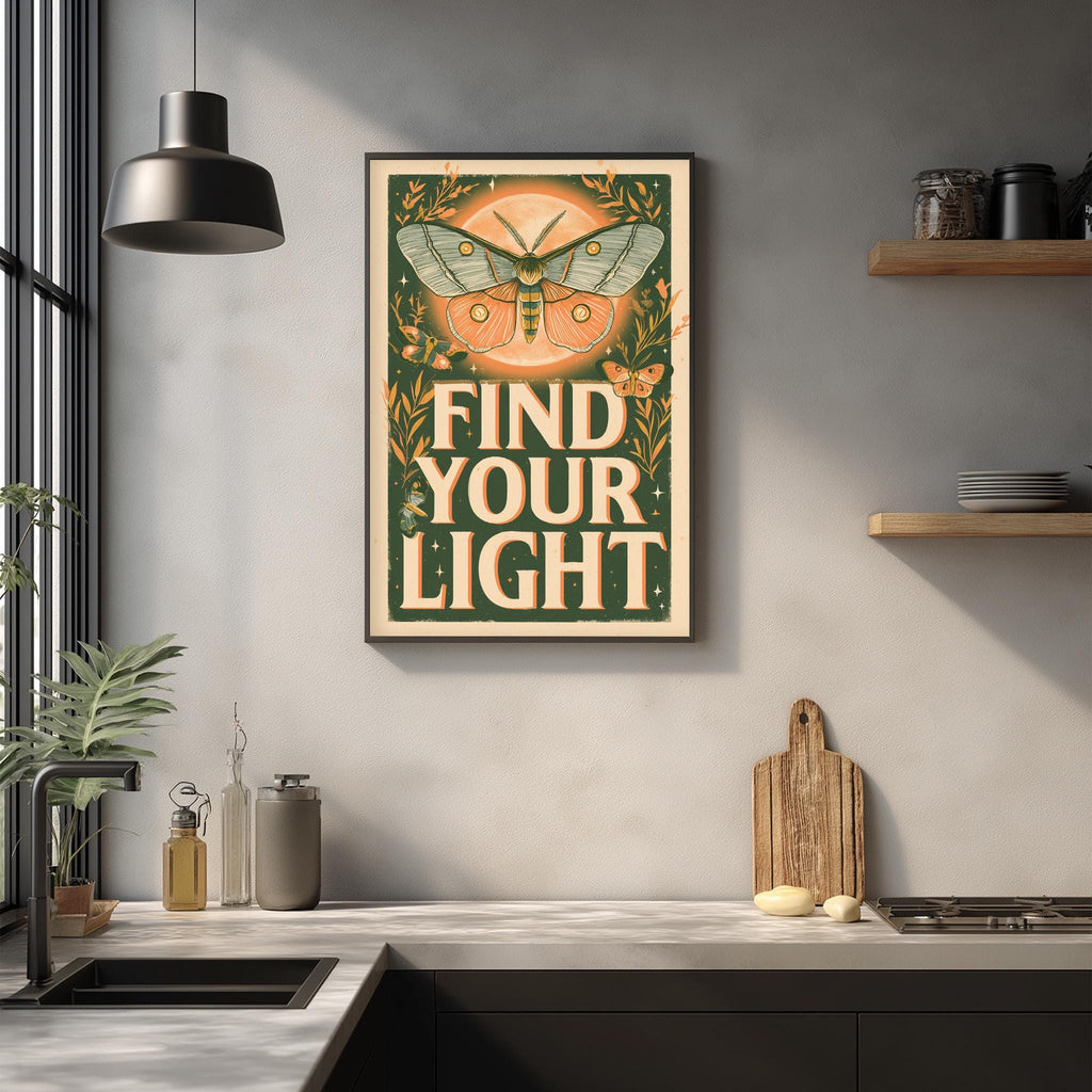 a kitchen counter with a framed poster that reads "FIND YOUR LIGHT" above it. The poster has a butterfly design and the text is written in a vintage style.
