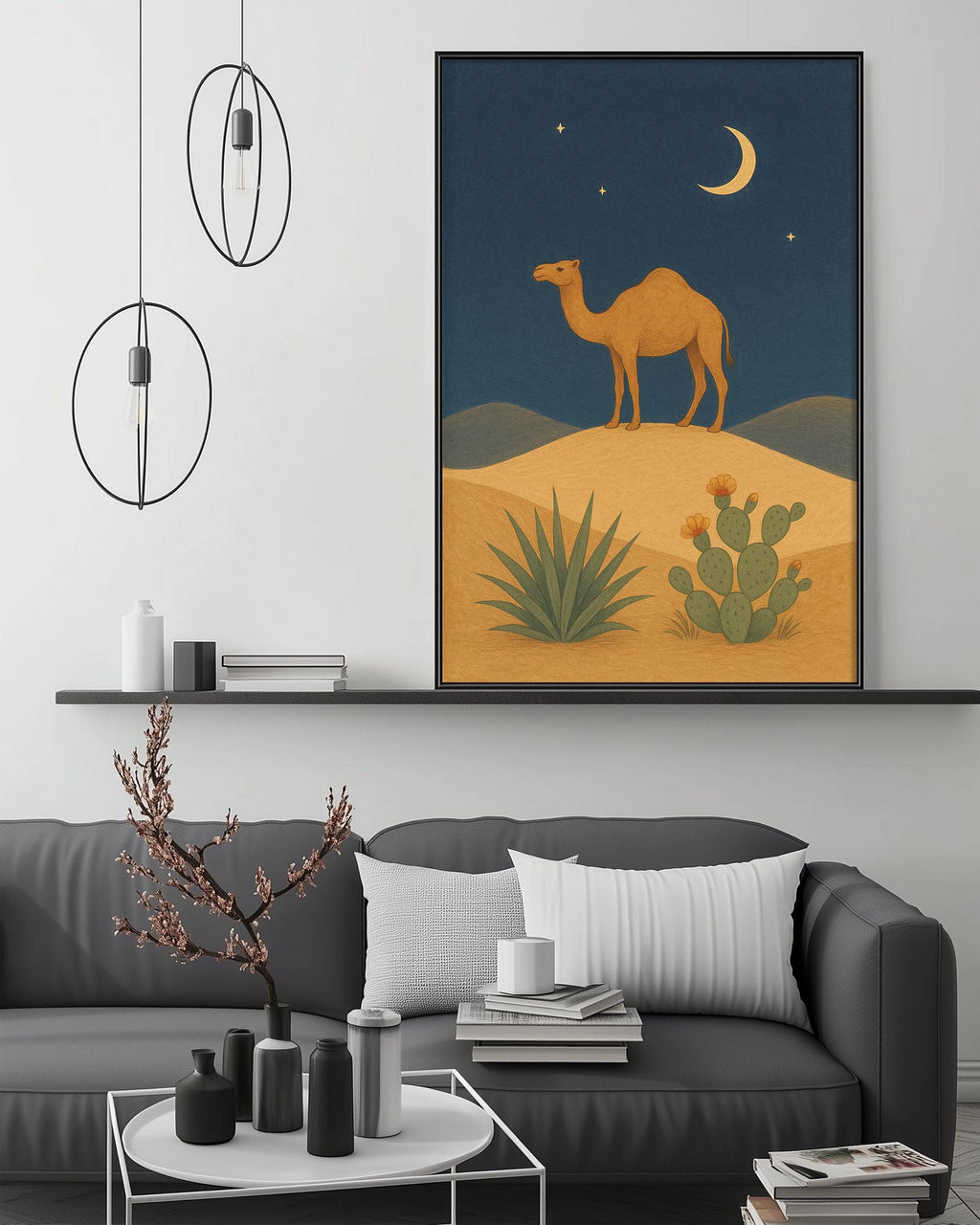 a living room with a gray sofa, a coffee table, and a framed painting of a camel on a desert landscape hanging on the wall above the sofa.