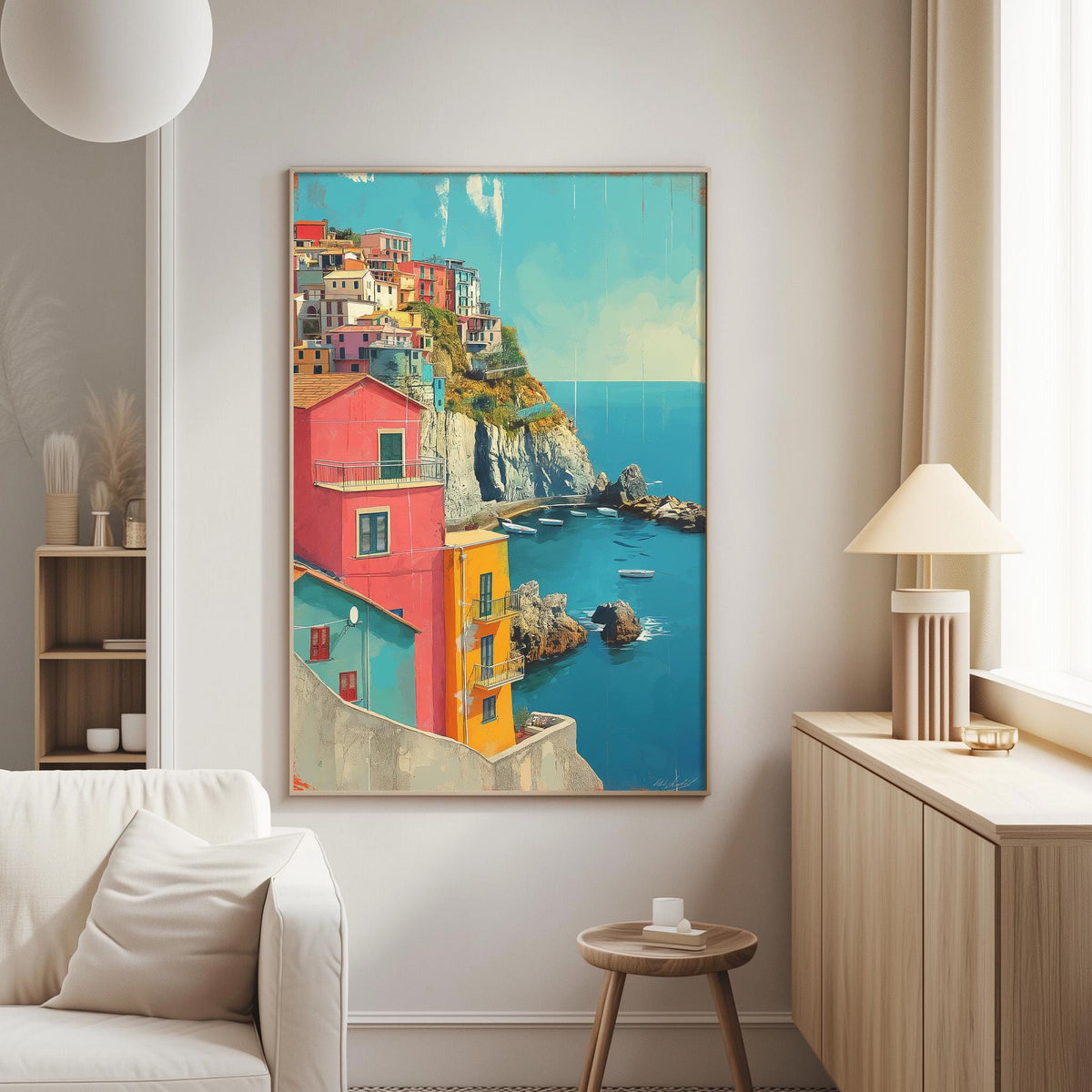 a large, colorful painting of a coastal town with buildings in various shades of red, yellow, and blue, set against a backdrop of a blue sky and ocean.