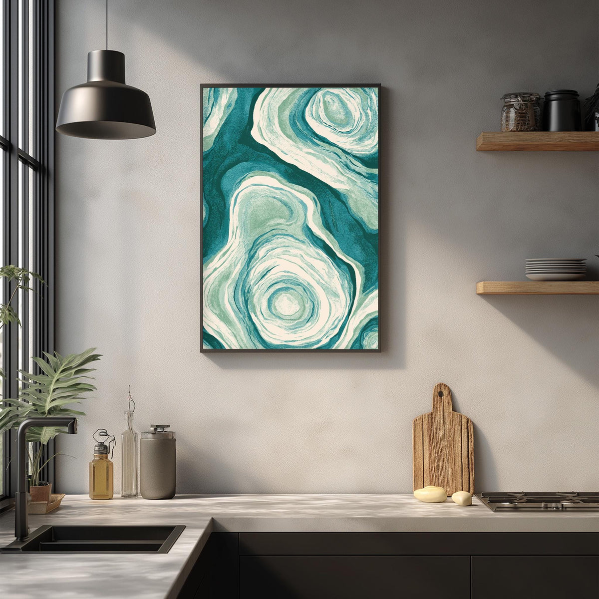 a modern kitchen with a large abstract painting hanging on the wall above a wooden cutting board and other kitchen items.