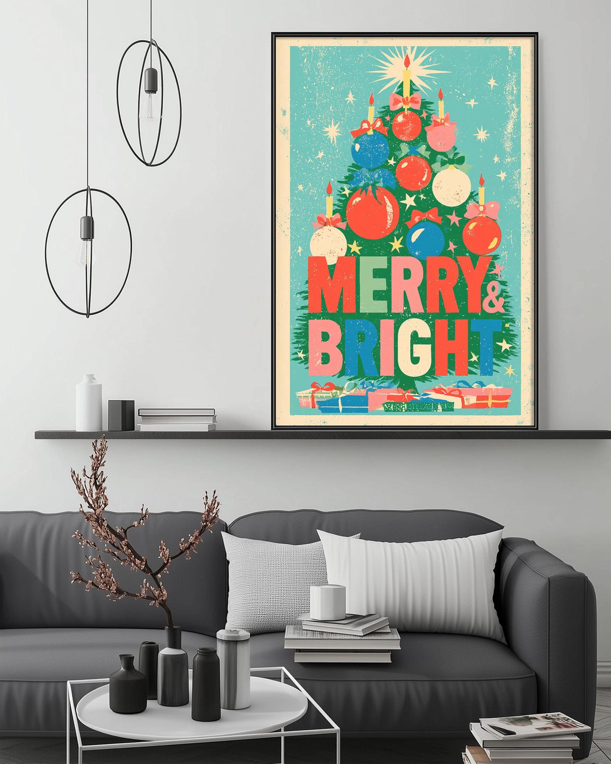 a cozy living room with a gray couch, a coffee table, and a large framed poster of a Christmas tree with ornaments and a "Merry & Bright" message.
