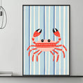 a living room with a gray couch, a coffee table, and a framed picture of a red crab on the wall.