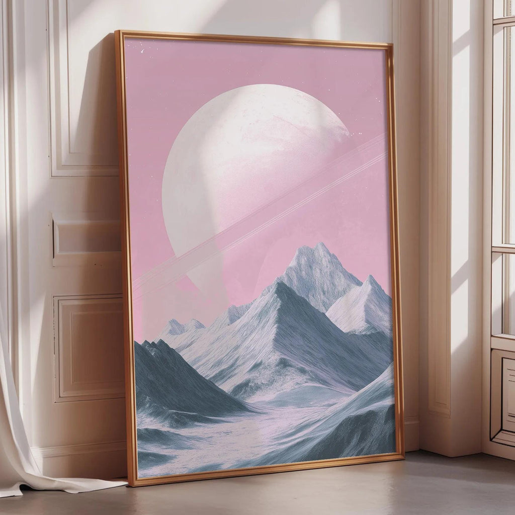 a large, framed picture of a mountain landscape with a large, pink planet in the sky.