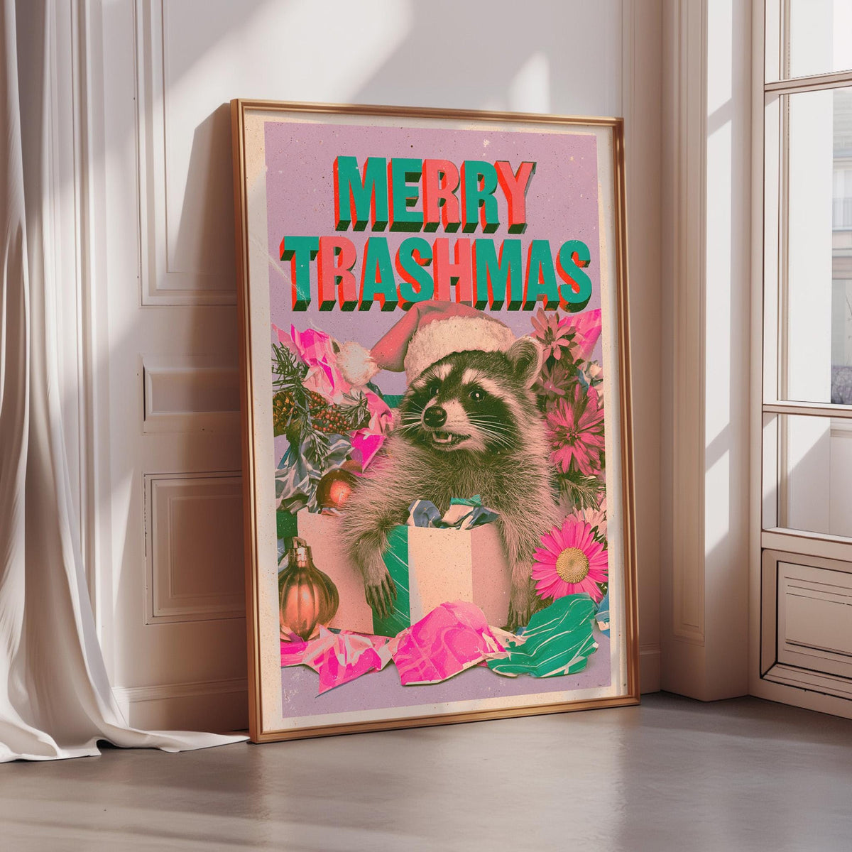 A framed poster with a raccoon wearing a Santa hat and surrounded by Christmas decorations, including flowers and presents.