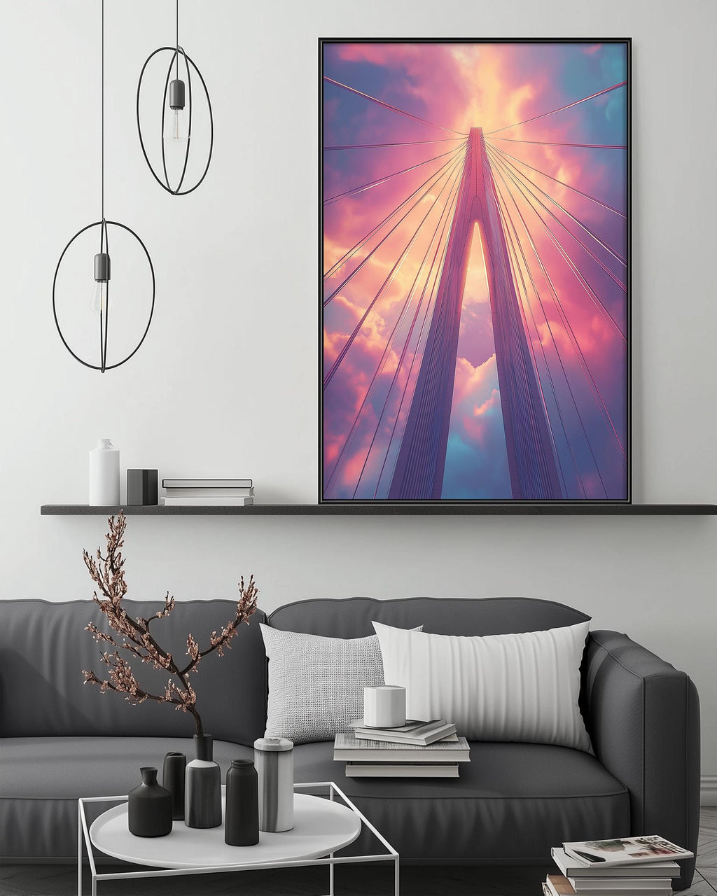 a large, colorful painting of a bridge with a dramatic sky in the background, hanging on a wall above a gray couch with white pillows.