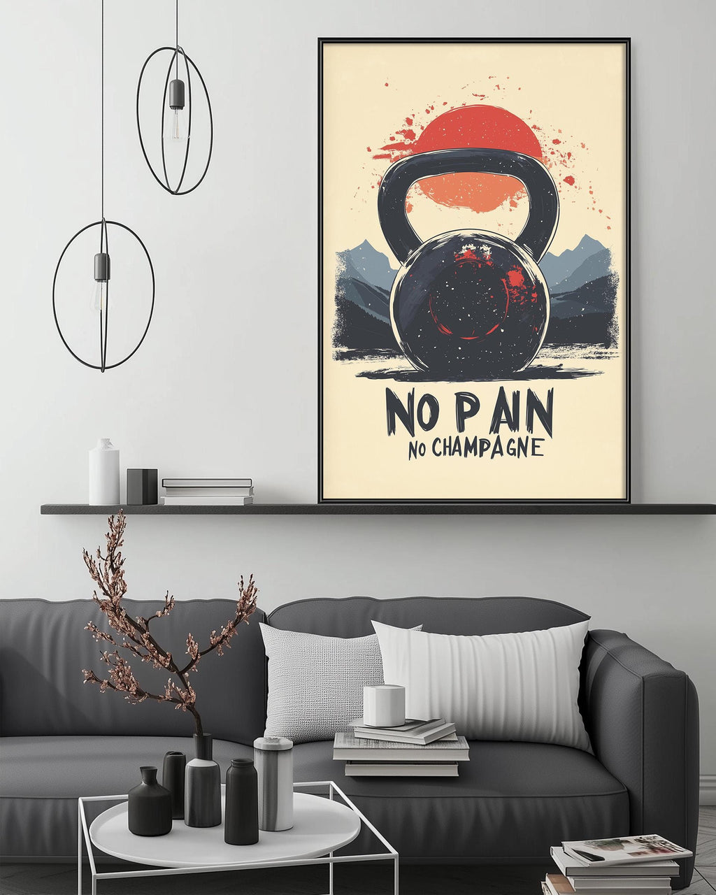 a black and white living room with a gray couch, a coffee table, and a framed poster on the wall.