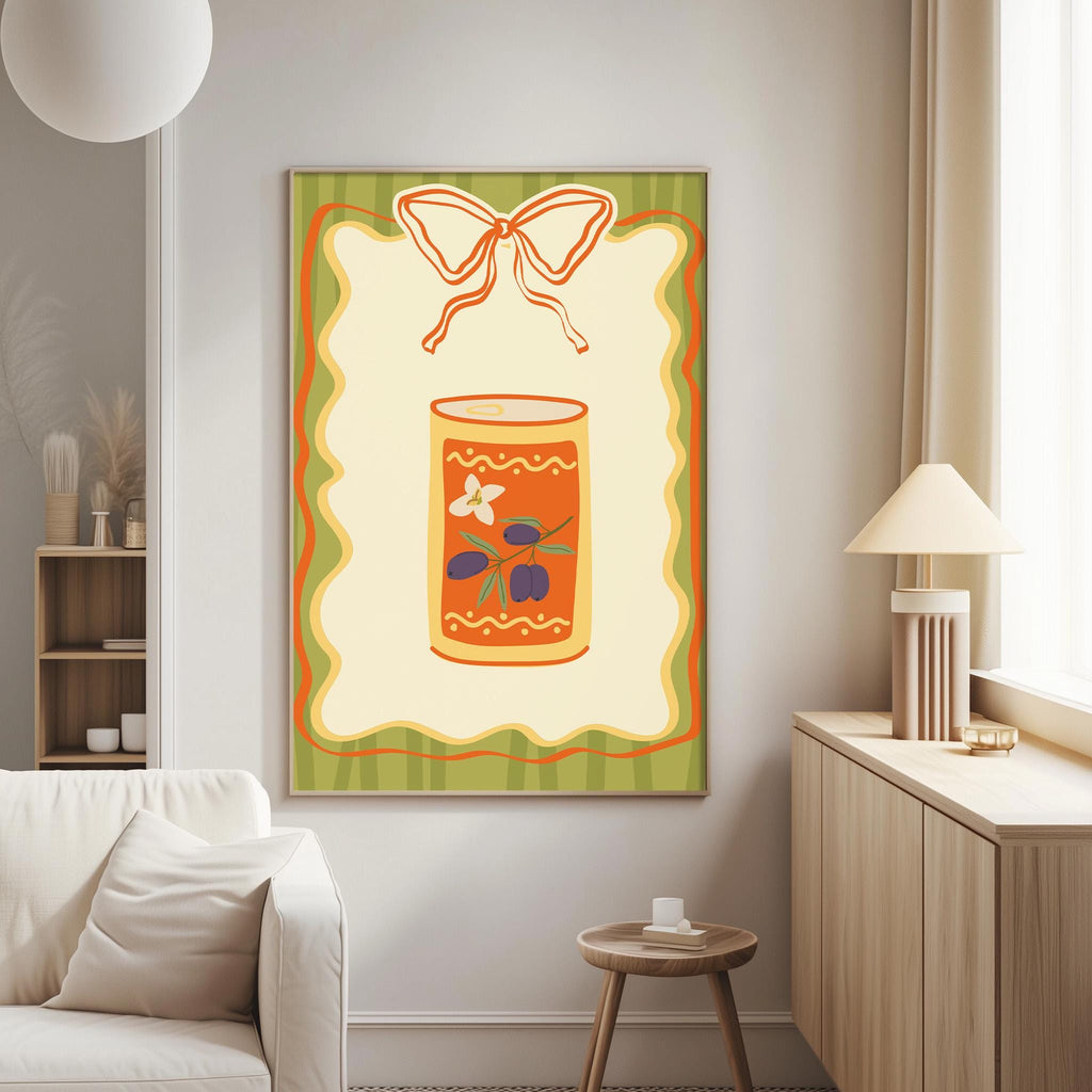 a cozy living room with a white sofa, a wooden side table, and a lamp. A large framed picture of a can of soup with a bow on top is hanging on the wall, adding a decorative touch to the space.