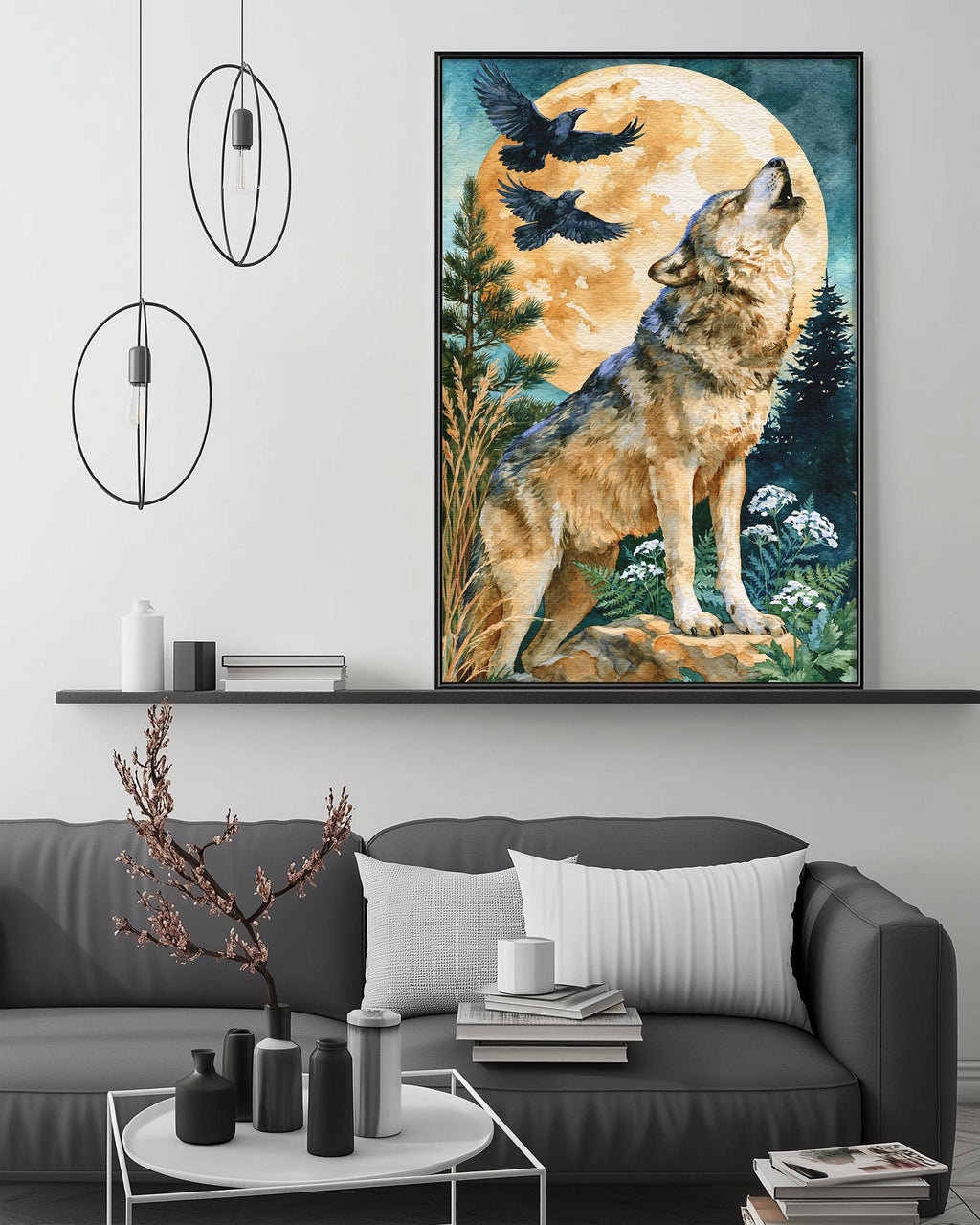 a large framed painting of a wolf howling at a full moon, hanging on a wall above a gray couch with a coffee table in front of it.