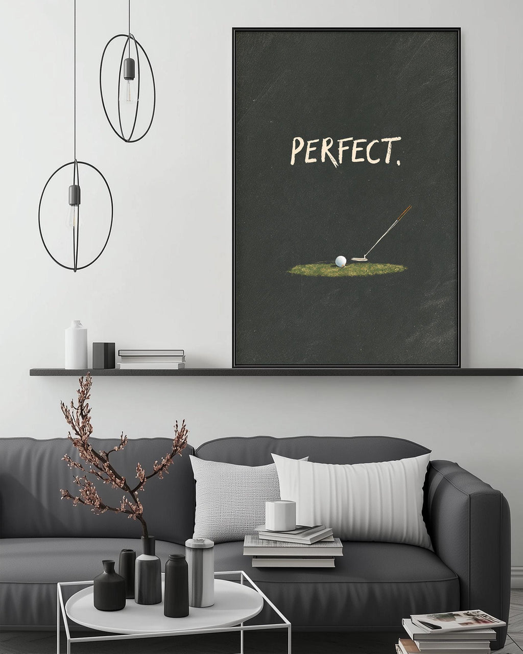 a modern living room with a gray sofa, a coffee table, and a large framed poster with the text "PERFECT."