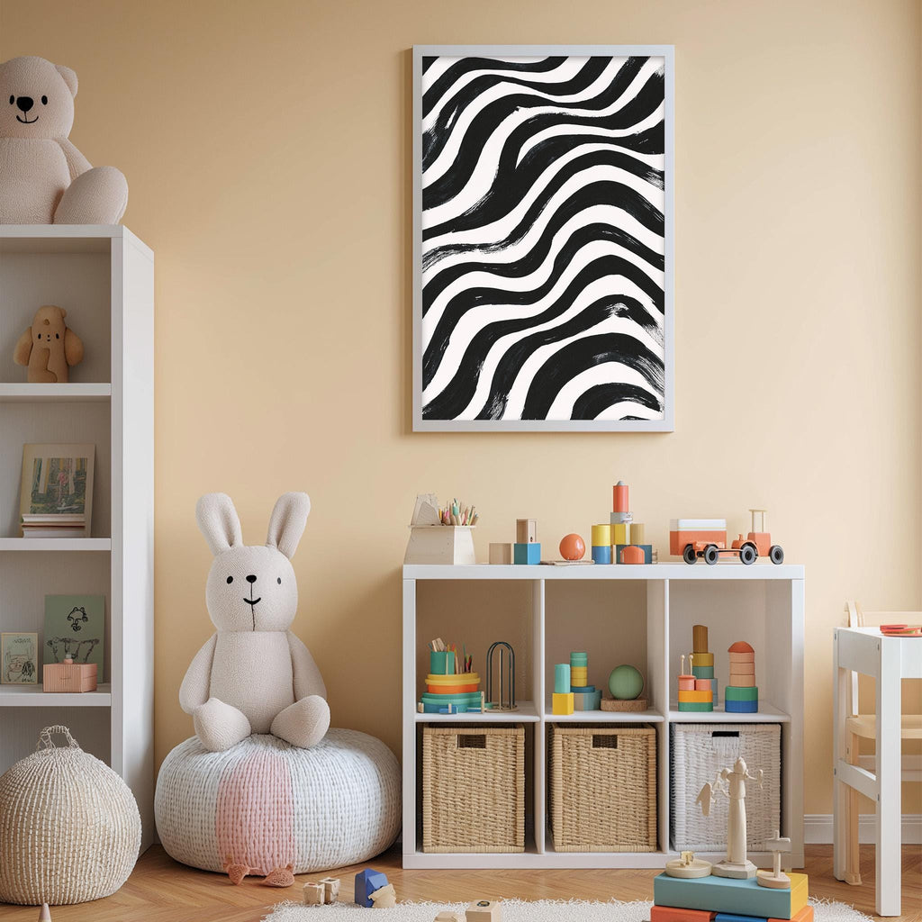 A cozy and colorful children's playroom with a white bookshelf, a plush rabbit, and a toy train set. The walls are painted a light peach color, and a black and white striped abstract painting is displayed above the bookshelf.