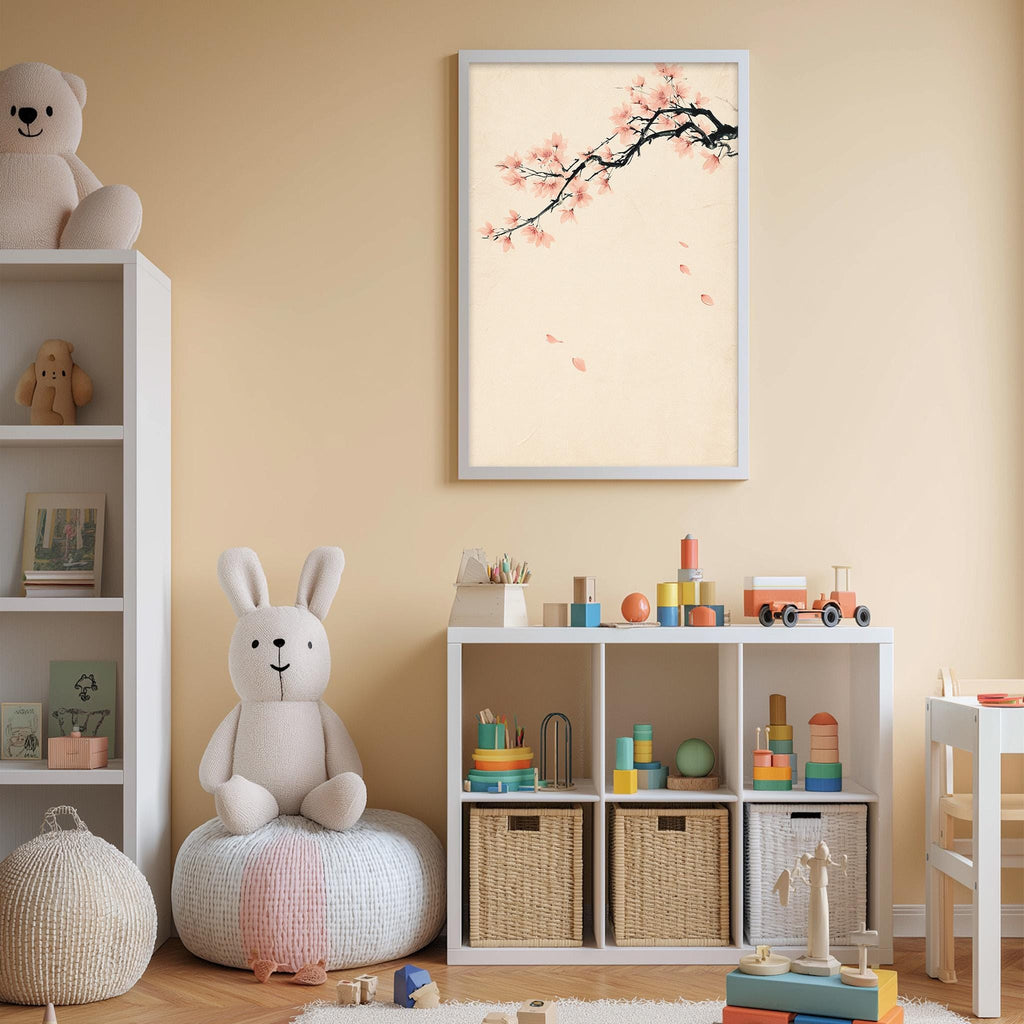 A cozy and well-organized children's playroom with a white bookshelf, a plush rabbit, and a toy train set. The room has a warm, inviting atmosphere with a framed picture of a cherry blossom tree on the wall.