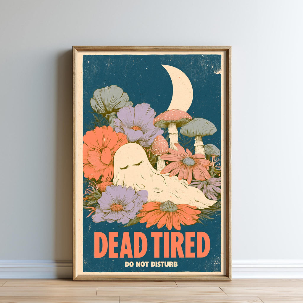 The image is a framed poster with a whimsical, artistic design featuring a ghost-like figure surrounded by colorful flowers and mushrooms. The poster has a vintage, retro style with a dark blue background and a crescent moon. The text "DEAD TIRED" is prominently displayed, and the phrase "DO NOT disturb" is also included.