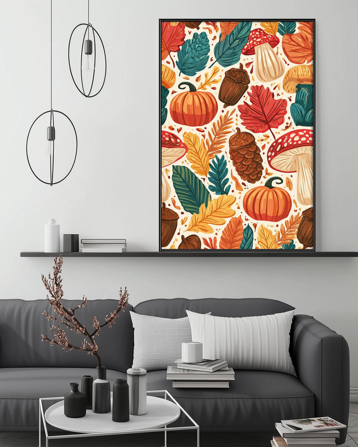 a cozy living room with a gray sofa, a coffee table, and a large framed print of autumn leaves and pumpkins hanging on the wall above the sofa.