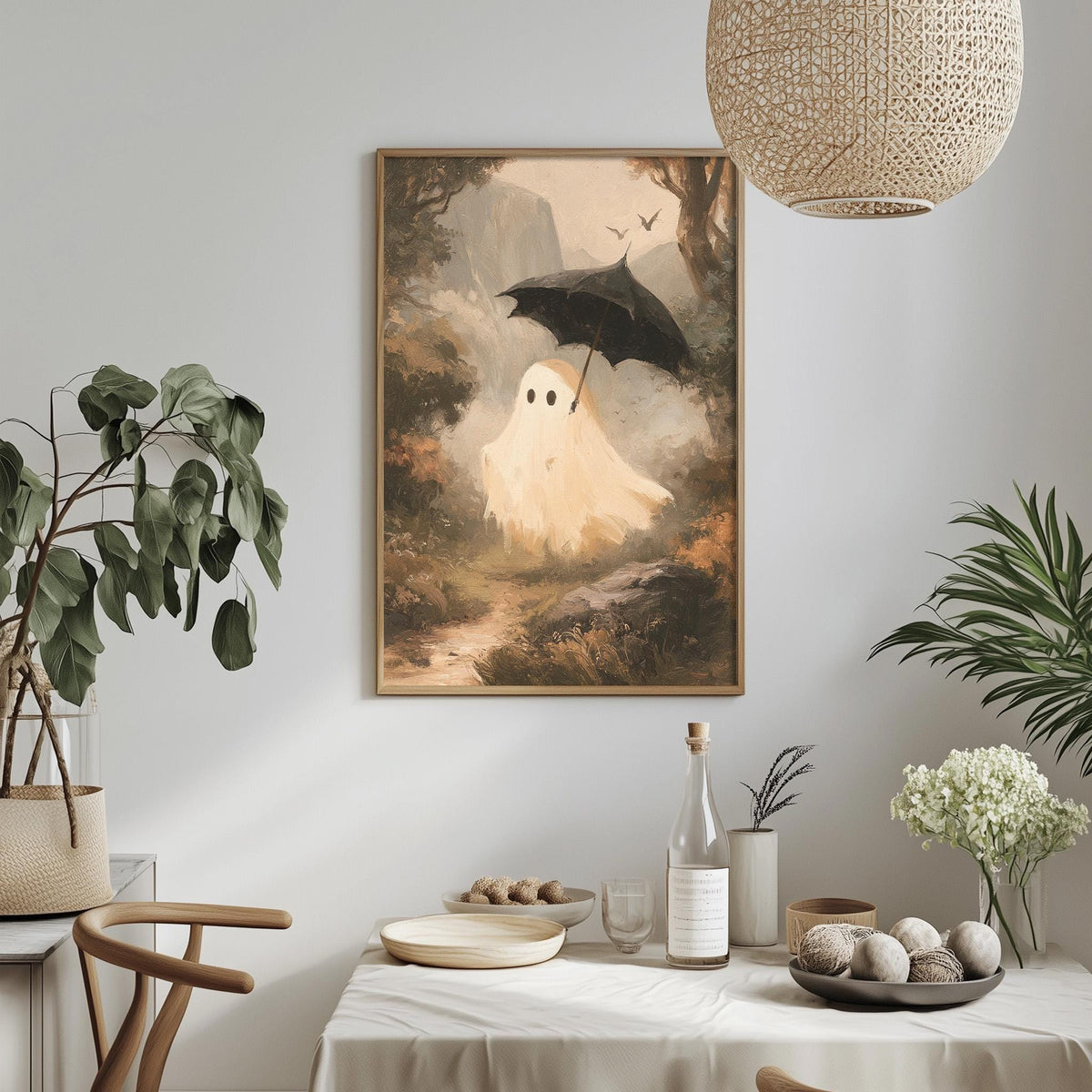 a painting of a ghost holding an umbrella, hanging on a wall above a table with various items on it.