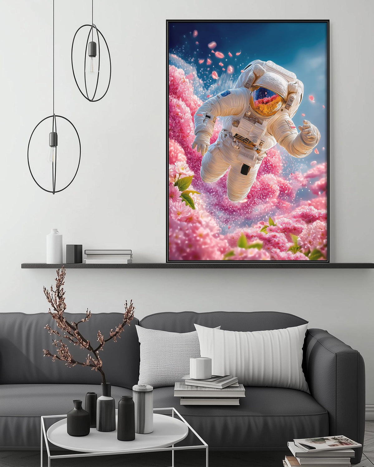 a large, colorful painting of an astronaut floating in a pink and blue floral field, with a black and white couch in the foreground and a shelf with various decorative items below.