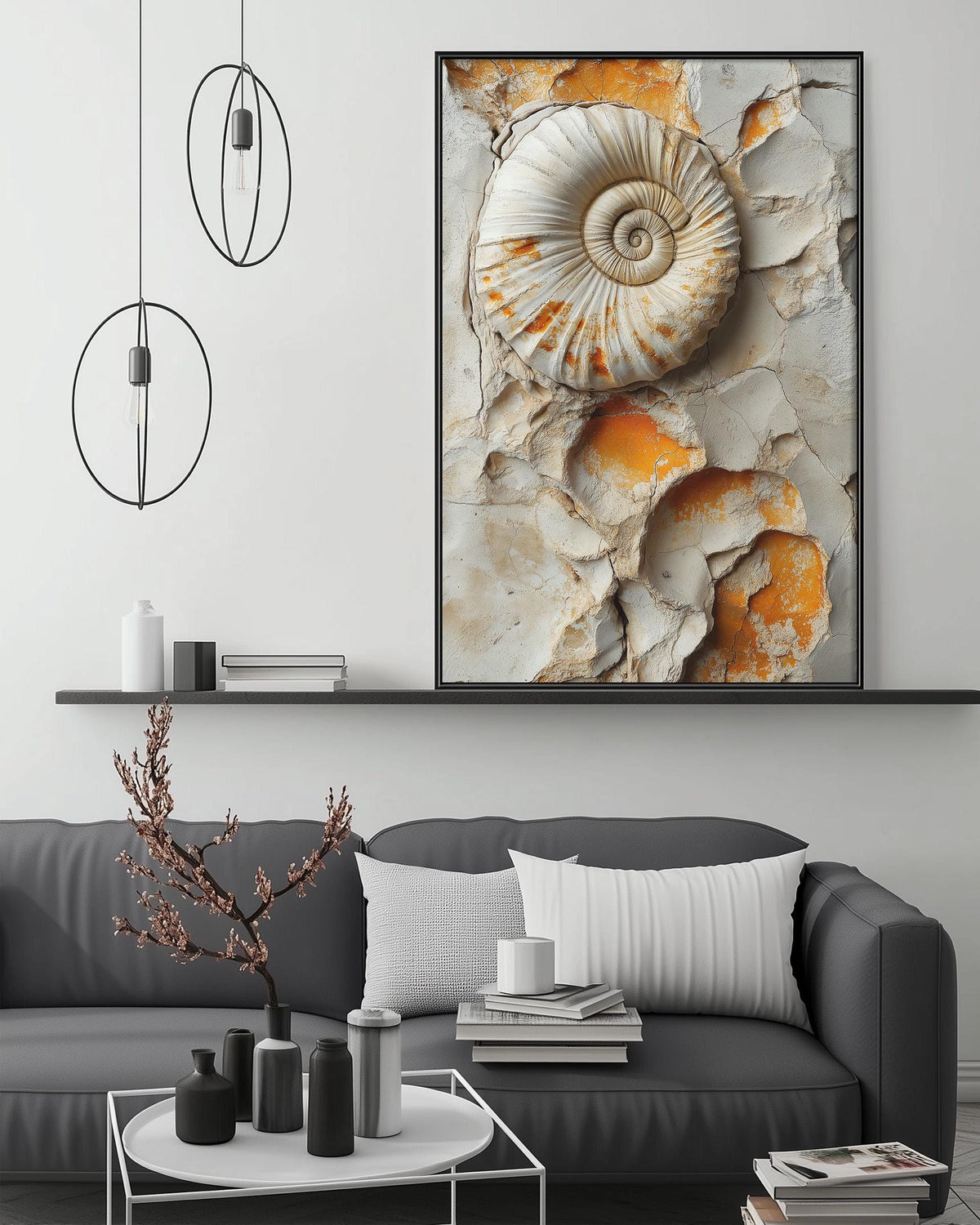 a living room with a gray sofa, a coffee table, and a large framed photograph of a shell on the wall.