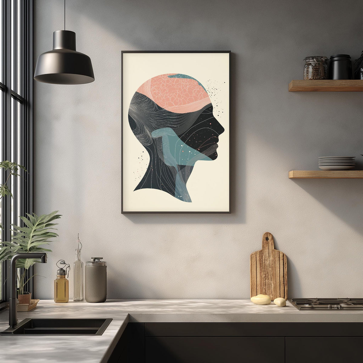 a modern kitchen with a minimalist design. The focal point is a framed abstract art piece depicting a human head in profile, hanging on the wall above a kitchen counter. The kitchen counter has various items such as a cutting board, a bottle, and a vase. The overall color scheme of the kitchen is neutral, with pops of color from the abstract art piece.