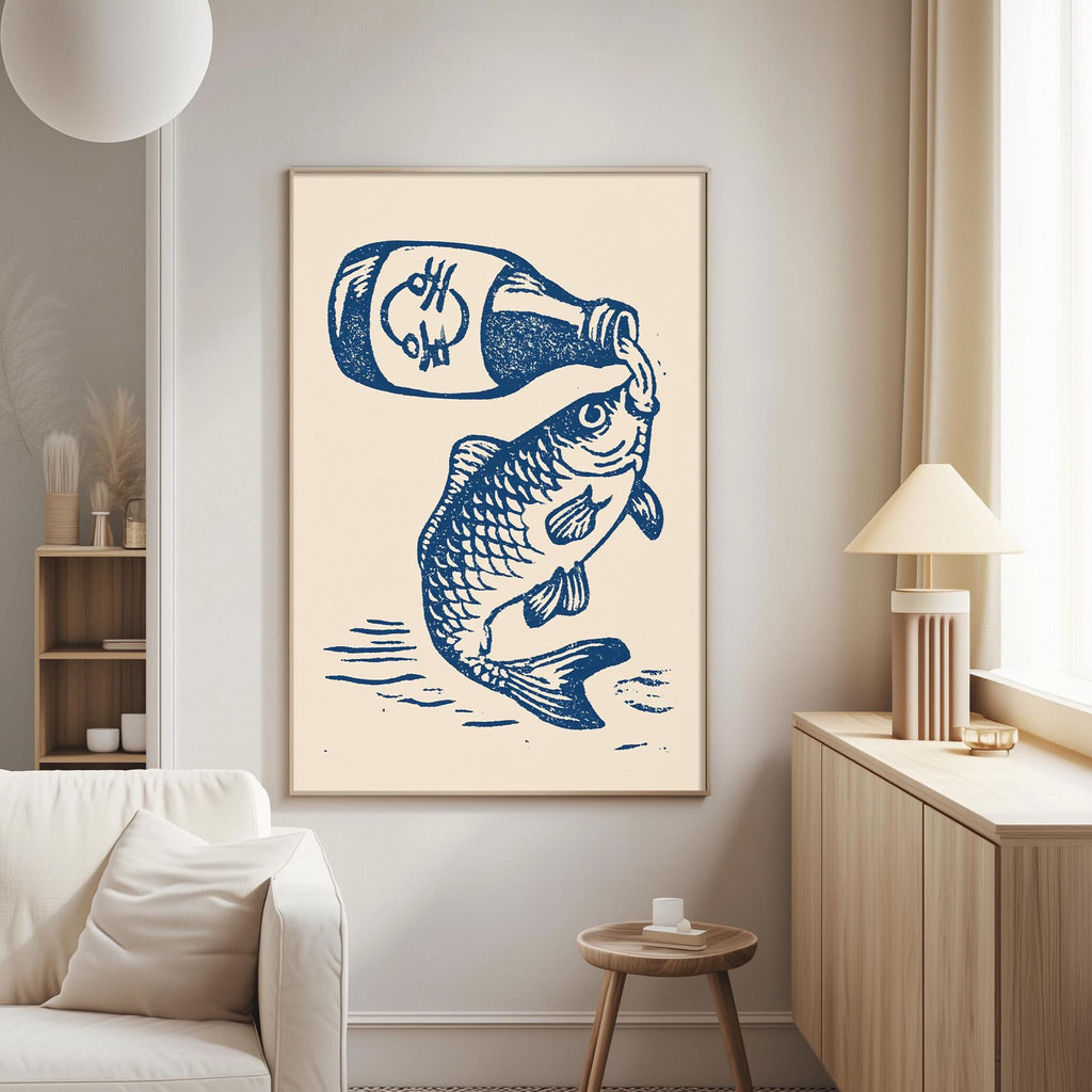 a large blue and white fish illustration on a wall, with a bottle of sauce being squeezed onto the fish.