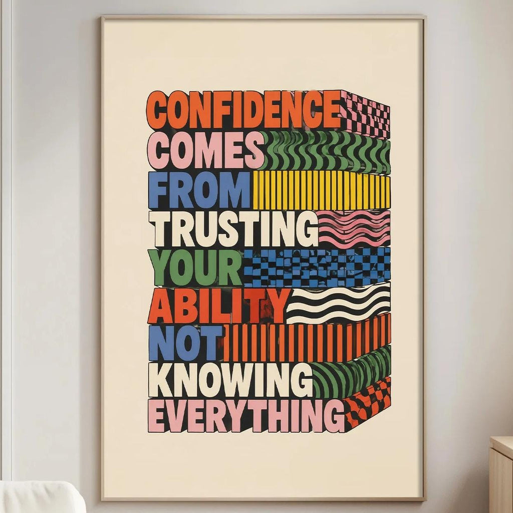 a poster with a motivational message hanging on a wall in a living room.